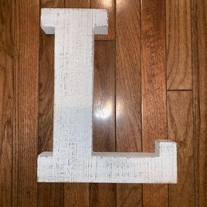 White wooden L sign
